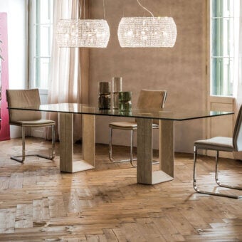 Refined Cattelan Italia Diapason table with transparent glass top and light beige marble base crafted in Italy