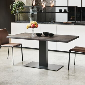 Elegant Cattelan Italia Elvis Wood table with titanium embossed steel base and irregular Canaletto walnut top crafted in lacquered finish