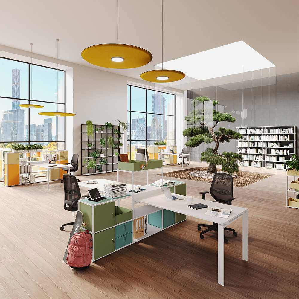 Modern office interior with beige walls, light wood floors, white desks with turquoise storage, yellow pendant lights, and a bonsai tree.