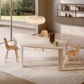 Exceptional MDF Italia Bonnet table with organically shaped melamine top and curved Coccioperla metal legs exhibiting a smooth matte finish