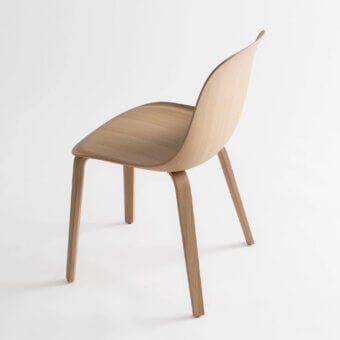 Exceptional MDF Italia Press chair crafted in bleached beech plywood emulating upholstered seating with a three-dimensional veneer finish