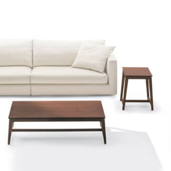 Distinguished Pacini & Cappellini Prisma coffee table with solid ash wood structure and veneered top in deep brown matte finish