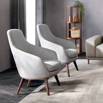 Captivating Pacini & Cappellini Spring lounge chair in woven light gray fabric with a solid ash wood base