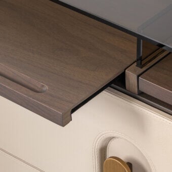 Exquisite Turri Vine dresser with wooden structure and leather-covered drawers, plus bronzed glass and brushed gold metal details