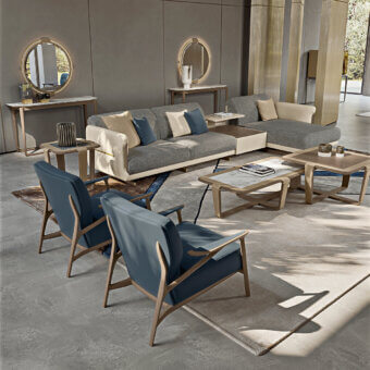 Harmonious Turri Vine lounge chair with branched natural wood structure and muted blue textile upholstery finished with smooth polish