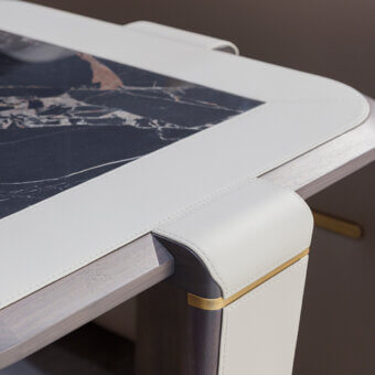 Lavish Turri Vine side table with a dark marble insert and brushed gold embellished wooden base crafted in leather