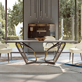Distinguished Turri Vine table with a natural wood structure and bronzed glass slabs, accented by marble inserts and a dark gray matte tabletop