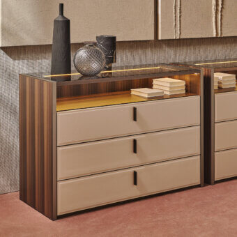 Superior Turri Vendome dresser with Eucalyptus or walnut wood construction and clear glass top with integrated lighting in a light tan finish