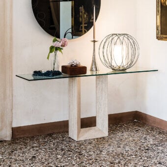 Distinguished Cattelan Italia Diapason console with transparent glass top and textured matte marble base crafted in Italy