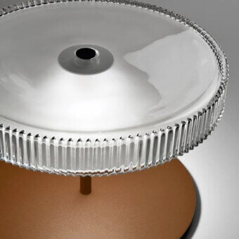 Distinguished Italamp Gilda table lamp with hand-carved transparent glass diffuser and corten finished metal details