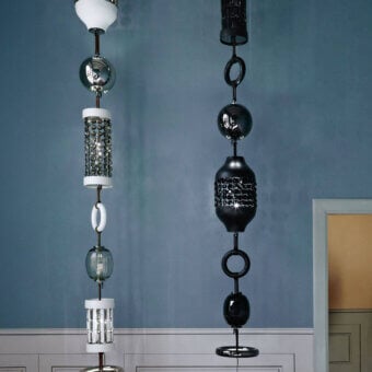 Distinguished Italamp Odette Odile suspension lamp with alternating white and silver-toned metal crafted with delicate crystal and luxurious leather details