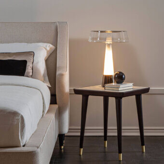Exclusive Italamp Teco table lamp with transparent glass shade and light gold finished metal base