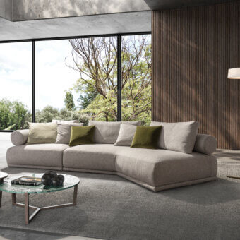 Elegant Pacini & Cappellini Hills sectional with light gray woven fabric upholstery and a wooden structure