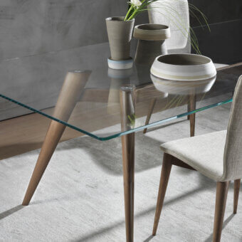 Distinguished Pacini & Cappellini Novecento table with transparent tempered glass and light-toned solid ash legs crafted in Italy