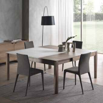 Distinguished Pacini & Cappellini Plurimo table with ash veneered top and white cimento panels in a matte finish