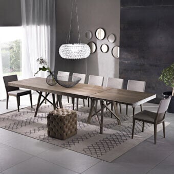 Distinctive Pacini & Cappellini Zeus extendable table with light brown matte finish and solid ash trestle base construction
