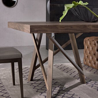 Distinguished Pacini & Cappellini Zeus table with rectangular Canaletto walnut top and intricately woven legs in a matte finish