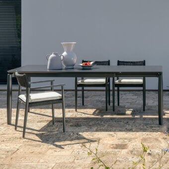 Exceptional Talenti Dolcevita Alu table with extending stoneware top and slender legs crafted for outdoor spaces