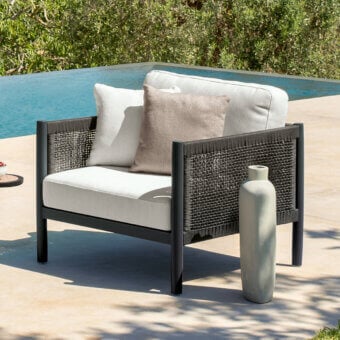 Distinctive Talenti Dolcevita Alu lounge chair with woven synthetic material sides and back in matte metal finish with white and light brown textile cushions