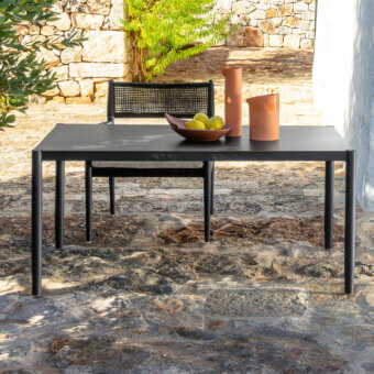 Elegant Talenti Dolcevita Alu table with linear design and dark matte metal cylindrical legs crafted in Italy