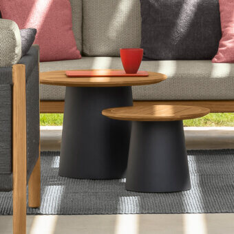 Sophisticated Talenti Dolcevita Wood coffee table with a round teak wood top and dark conical aluminum base