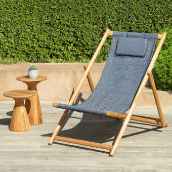 Distinguished Talenti Dolcevita Wood deck chair with woven blue sling seat and natural teak wood grain finish