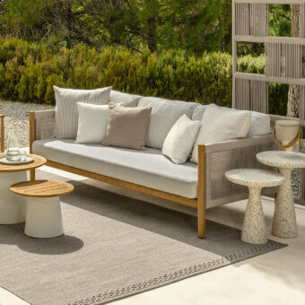 Superior Talenti Dolcevita Wood sofa with light gray textile seating and striped beige cushions in matte teak wood