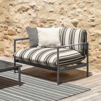 Exceptional Talenti Nalu lounge chair with striped dark gray and off-white textile cushions and matte painted aluminum frame