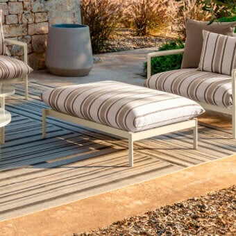 Elegant Talenti Nalu ottoman with light beige and taupe striped cushion and matte finish metal frame