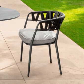 Superior Talenti Swipe armchair with light gray woven seat and dark geometric rope backrest in matte dark gray aluminum
