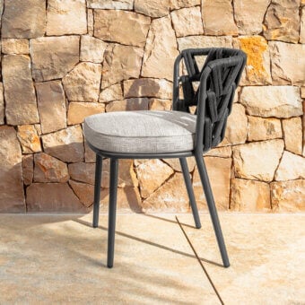 Exceptional Talenti Swipe chair with a geometric dark gray woven rope backrest and light gray seat cushion crafted in aluminum