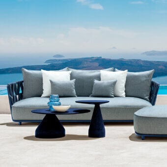 Distinguished Talenti Swipe sofa with light grey woven cushions and a blue-grey aluminum backrest crafted with padded rope weave
