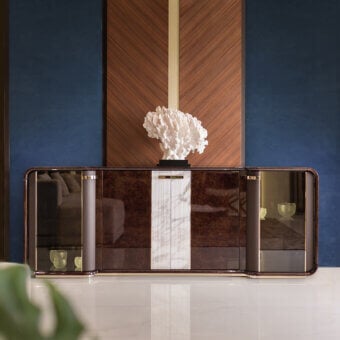 Distinguished Turri Madison sideboard with subtly grooved white panels and glossy lacquered brown wood build, showcasing illuminated glass shelving