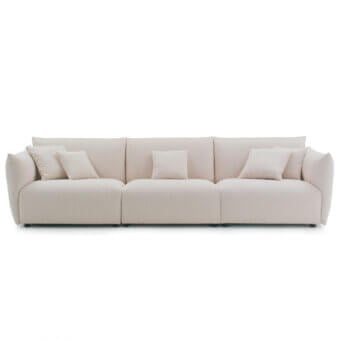 Siesta sofa by 4Mariani, beige bouclé fabric, three-section modular design with square pillows and minimalist black base.