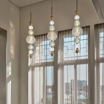 Distinguished Italamp Greta suspension lamp with hand-cut crystal diffusers and refined metal in shiny nickel finish