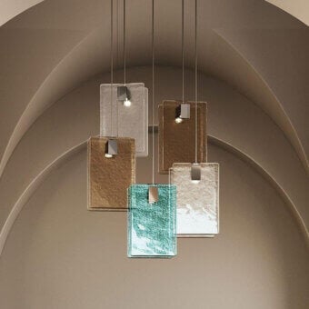 Captivating Italamp Mura suspension lamp with cast glass panels in clear, amber, turquoise and chrome metal details offering softly diffused light