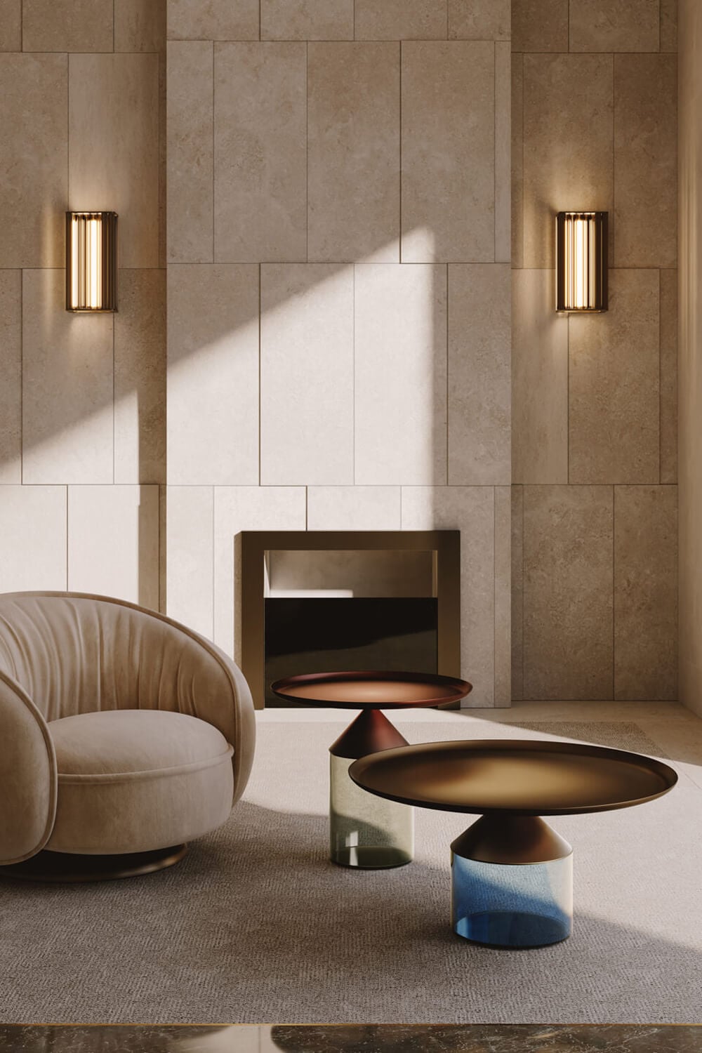 Venicem Numa wall lamps with brass accents flank a beige tiled fireplace above blue and copper nesting tables on a gray rug.