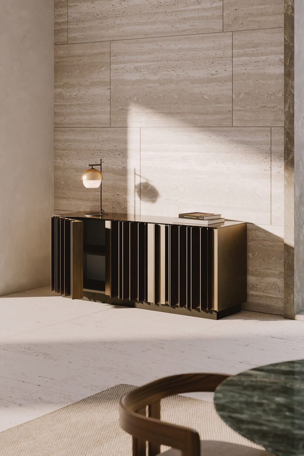 Marble console table with ribbed facade, black metal lamp, and travertine tile wall in a naturally lit interior setting.