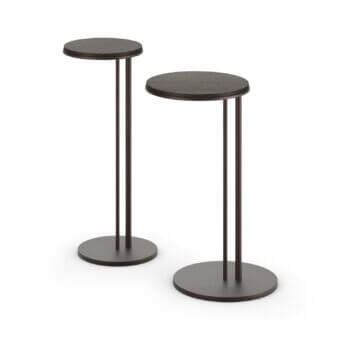 Cattelan Italia side tables, dark sting wood tops, cylindrical dark bronze metal legs, minimalist modern design, studio product shot.