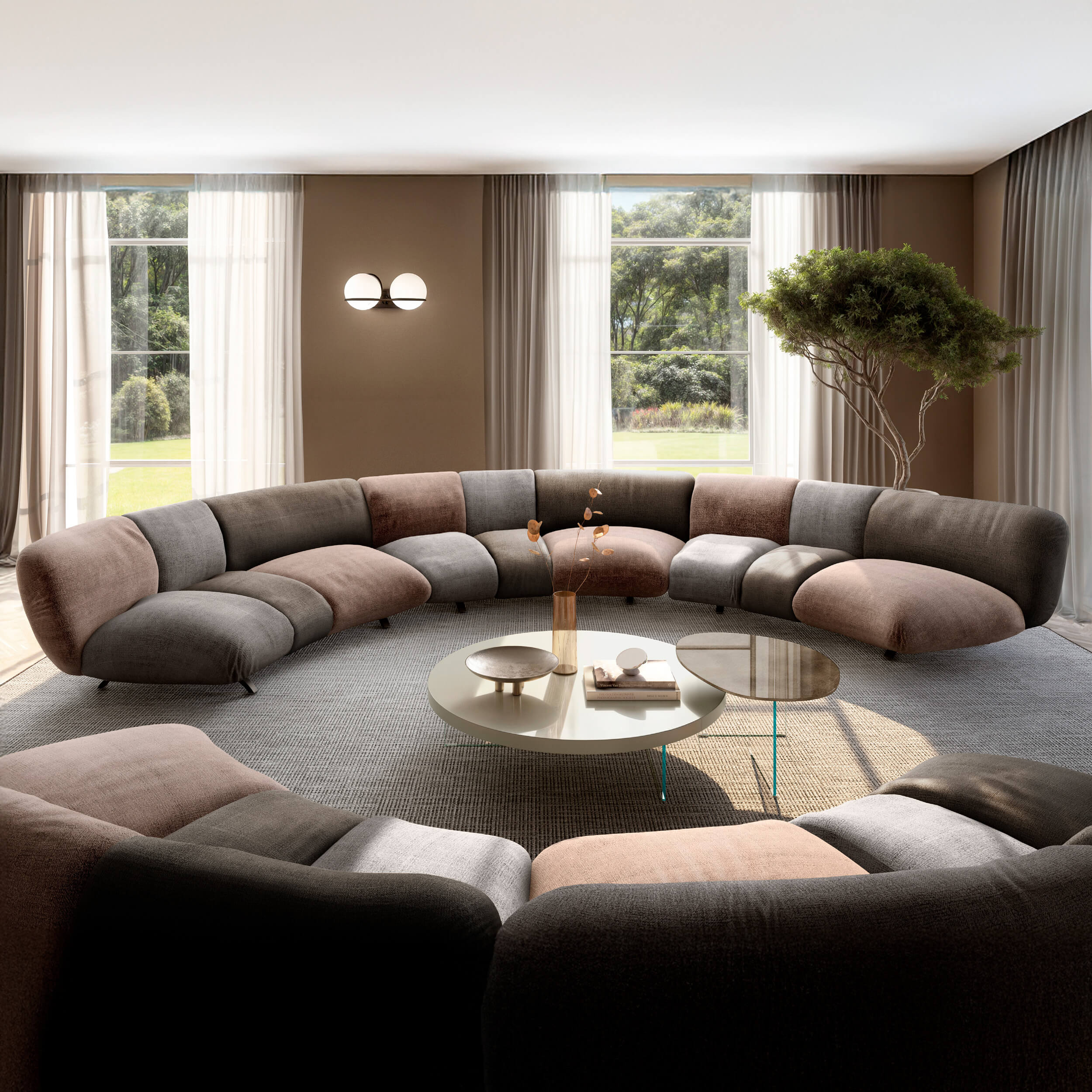 Modular sofa in gray, brown, and beige fabric curves around a glass coffee table in a digitally rendered living room interior.