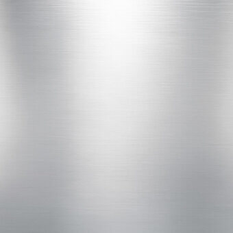 Brushed chrome texture displaying a vertical linear grain, transitioning from bright white to cool gray, with a smooth metallic sheen.