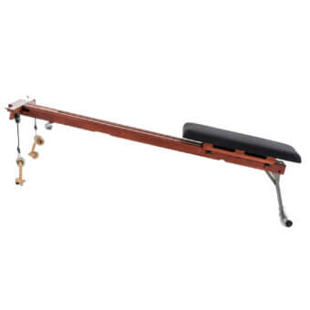 Rowing machine, reddish-brown wood, padded black seat, with knotted rope handles and metal footrest, studio shot, hardwood construction.