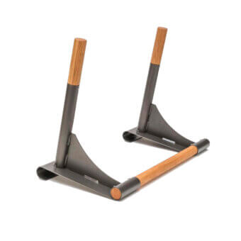 Fitness parallel bars, gray metal frame, light wood handles, triangular base, minimalist design, studio shot, ergonomic grip.