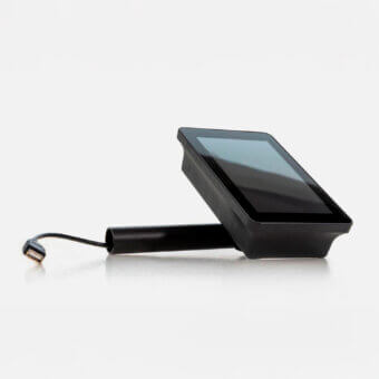 Slimbeam monitor, black matte finish, rectangular screen angled on stand with USB-C connector, minimalist studio product shot.