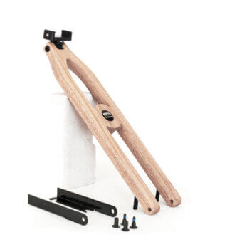 Vintage camera stand made of light wood with black metal joints, screws, and bracket displayed on a white background.