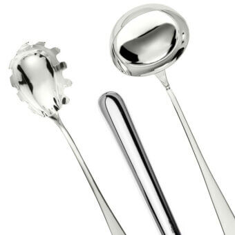 Silver serving cutlery set including pasta spoon, soup spoon, and fork with elongated handles and polished reflective finish.