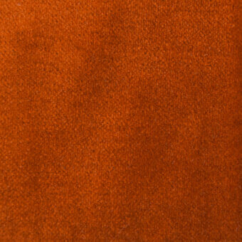 Orange felt texture with granular weave, displaying warm terracotta tones and subtle saturation variations under diffused, even lighting.