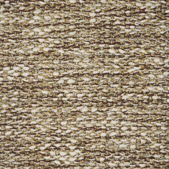 Beige and brown woven textile with irregular pattern, exhibiting a rough, nubby texture and dimensional horizontal-vertical thread structure.