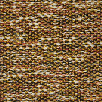 Dense woven textile with irregular black, yellow, red, and white pattern; tight, nubby weave of curved strands creates textured surface.