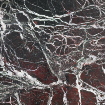 Rosso Levanto marble texture with dark gray base, thick white veining, and dispersed reddish-brown accents, polished surface.